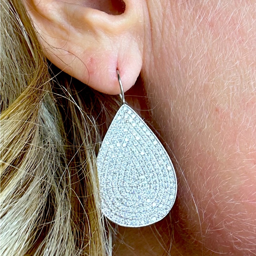 Stunning Teardrop Sterling Silver individually set CZ earrings